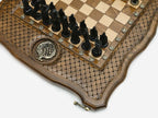 Pomegranate and grapevine bronze chess set shown folded