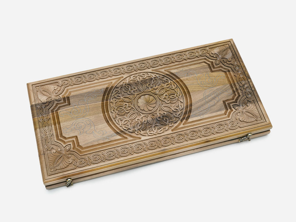 The walnut board folded shut on its clasps