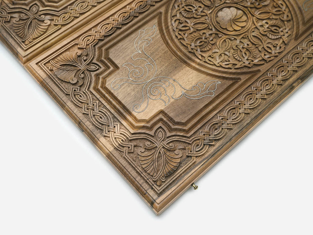 The carved ornament and silver work seen from another angle