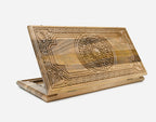 Luxury walnut backgammon board with real silver inlay and a carved central ornament, shown propped open