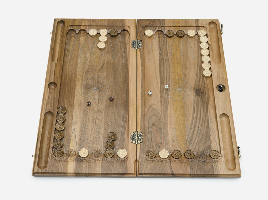 Detail of the silver inlaid into channels cut in the walnut