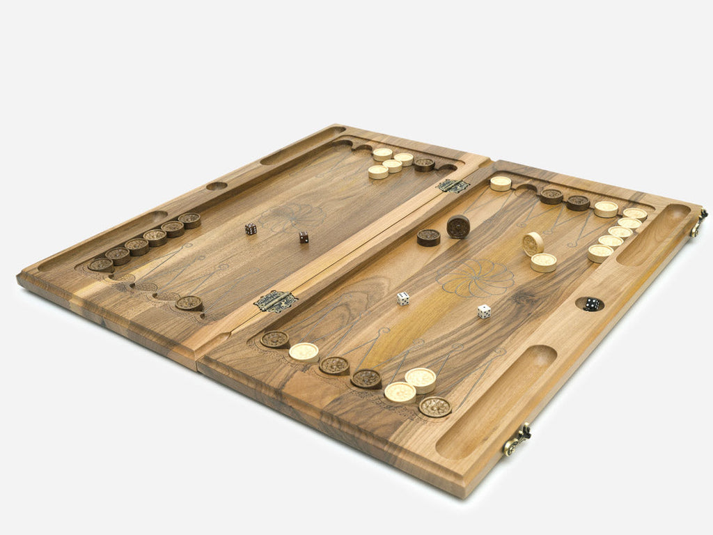 Angled view of the silver inlay walnut backgammon set