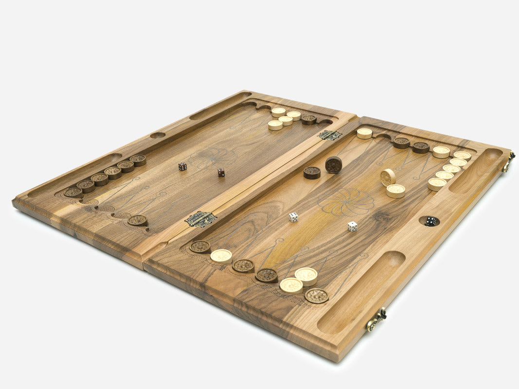 Angled view of the silver inlay walnut backgammon set