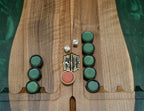 Close-up of the green epoxy chessboard squares and carved basket-weave