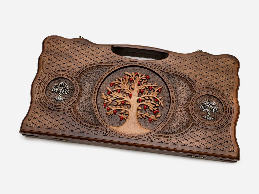 Angled view of the handmade Armenian backgammon set showing the three carved trees