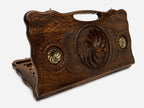 Carved beechwood backgammon board with the Armenian eternity symbol and bronze accents, propped open