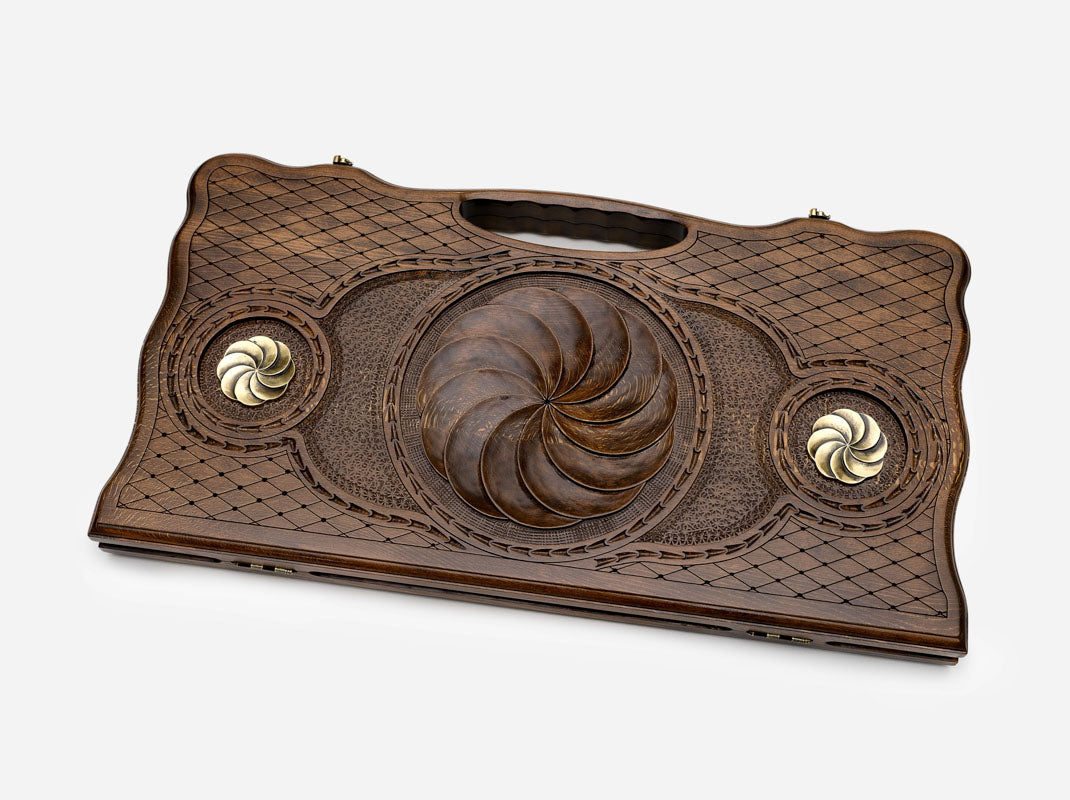 Angled view of the Armenian eternity symbol bronze backgammon board