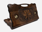 Carved beechwood backgammon board with an octagonal star and bronze details, propped open
