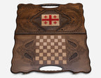 The cut-out carry handle and the upper carving of the lid