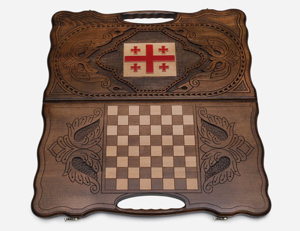 The cut-out carry handle and the upper carving of the lid
