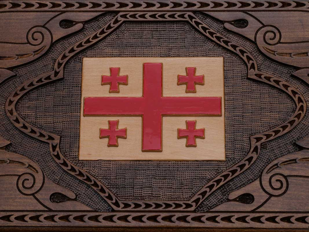 Detail of the interlaced ornament framing the shield