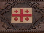Detail of the interlaced ornament framing the shield