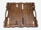 Angled view of the handmade Georgian backgammon set showing the carved lid