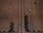 Close-up of the five-cross flag of Georgia carved into its shield