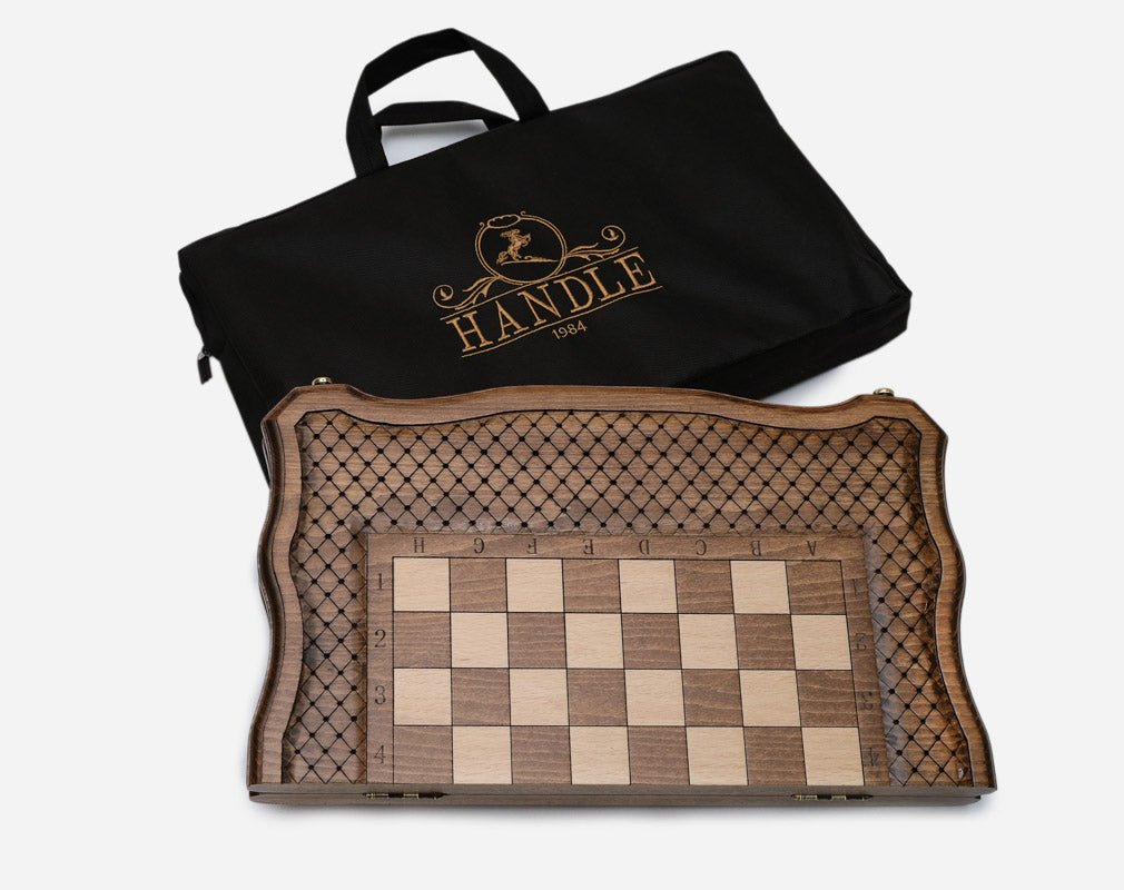 The chess set closed with its black carrying bag