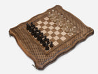 The chess set open at an angle showing the full board and pieces in play