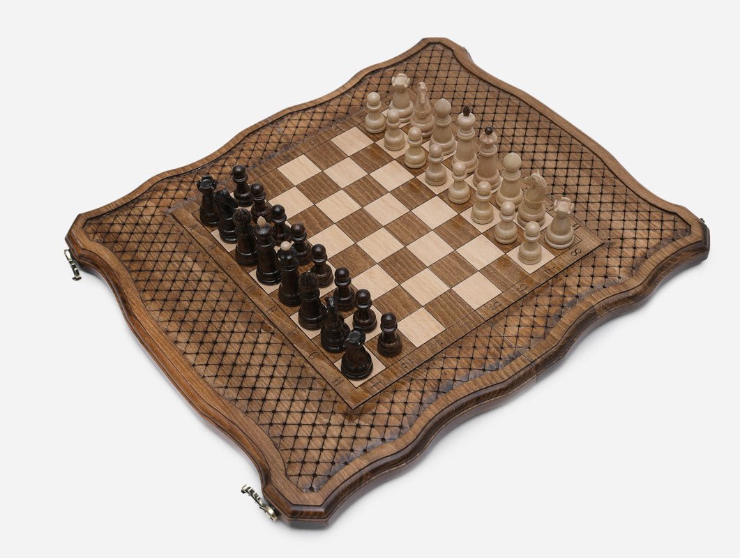 The chess set open at an angle showing the full board and pieces in play