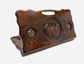Armenian backgammon board with a bronze pomegranate and a cut-out carry handle, propped open