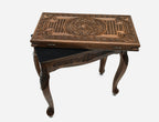 Central ornament backgammon table closed, angled view showing the carved lid and cabriole legs