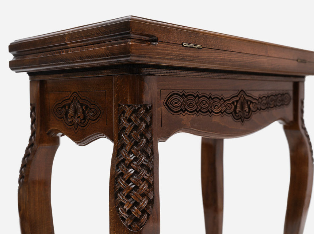 Central ornament backgammon table, angled view of the closed carved lid
