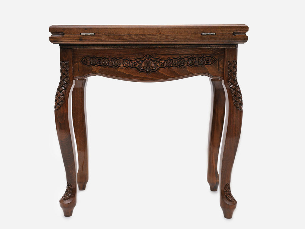 Central ornament table opening to reveal the playing field