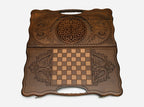 The cut-out carry handle and the upper carving of the lid