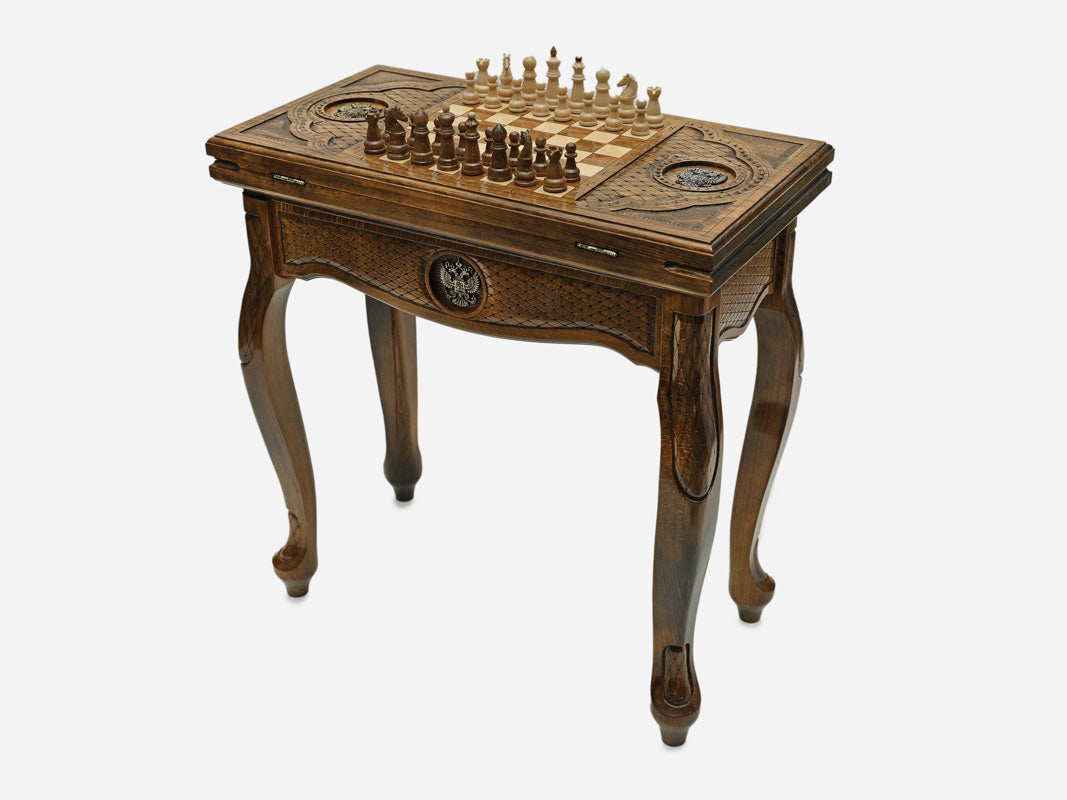 Russian chess and backgammon table with coat of arms, set up for chess, angled view