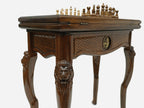 Lion table opened flat for backgammon with checkers set up, top-down view