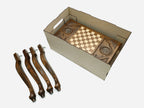 Tree of Life chess and backgammon table disassembled in its shipping crate