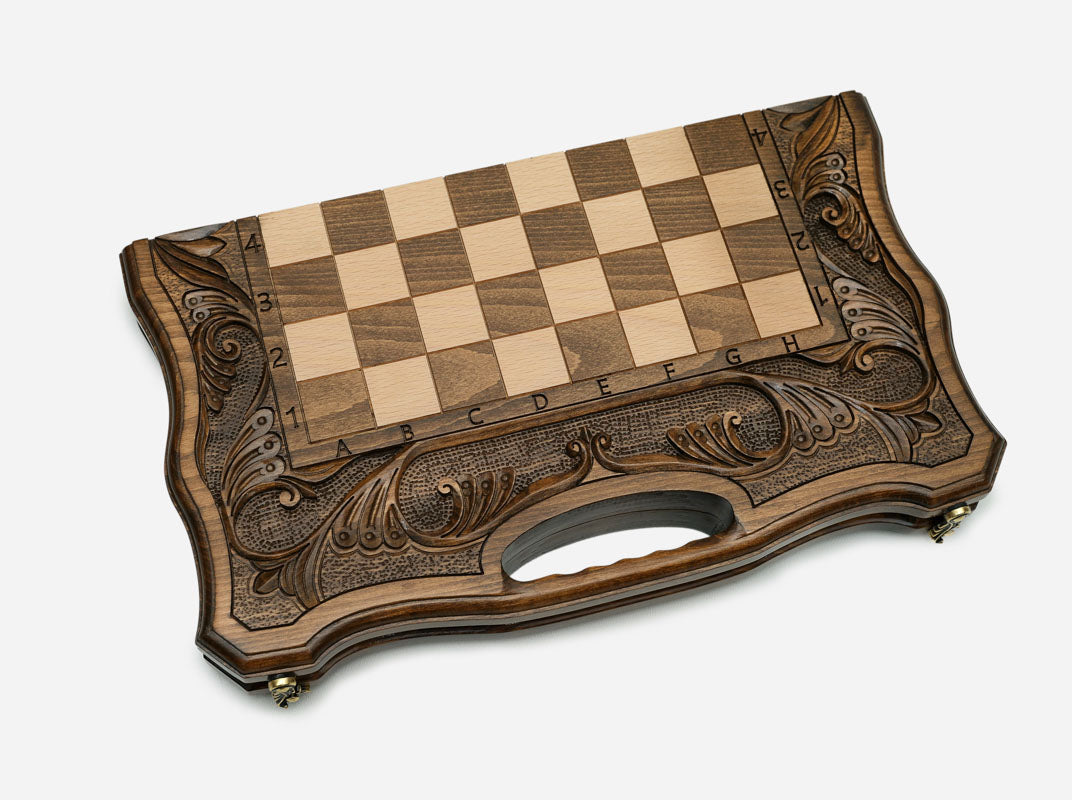 Side view of the closed carved board with its integrated carry handle