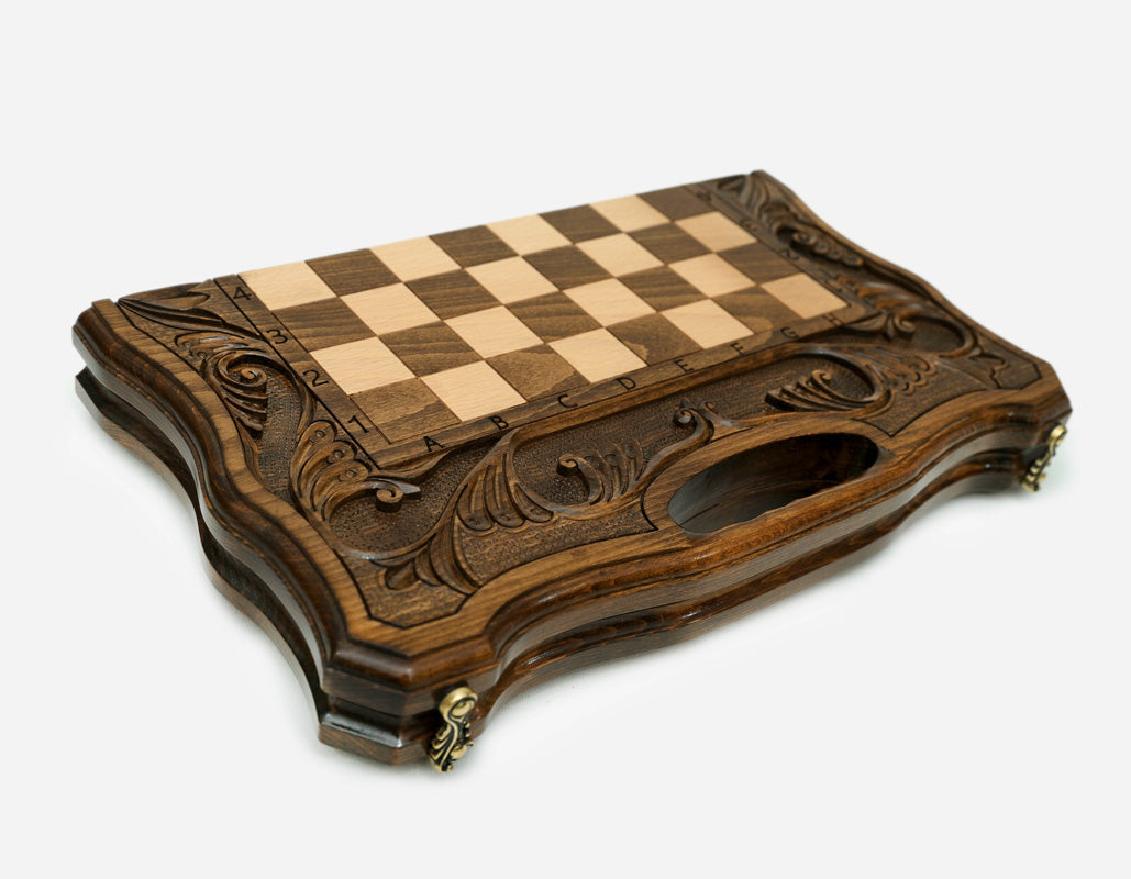 Detail of the turned chess pieces on the maple and walnut inlaid squares