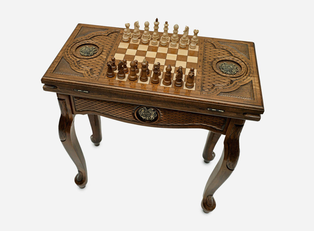 Armenian chess and backgammon table with coat of arms, set up for chess, angled view