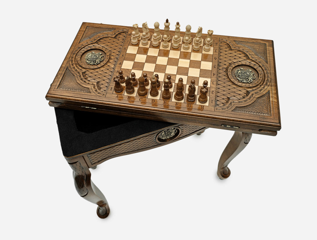 Coat of arms table opened flat for backgammon with checkers set up, top-down view