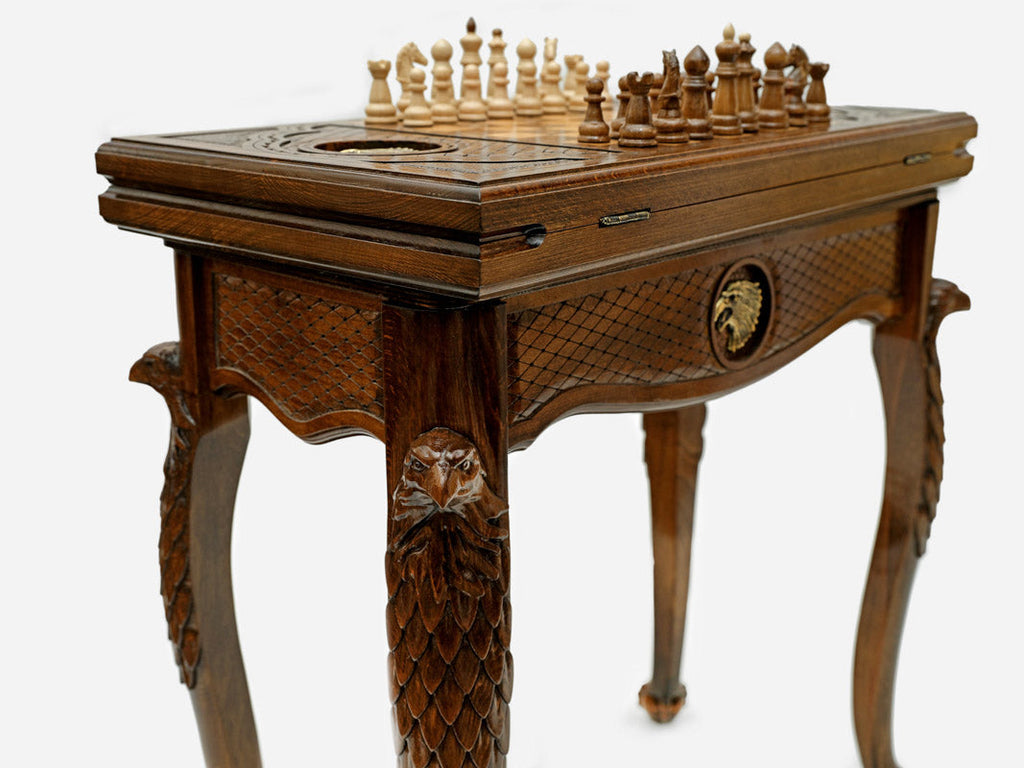 Close-up of the carved eagle leg and drawer front
