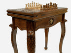 Close-up of the carved eagle leg and drawer front