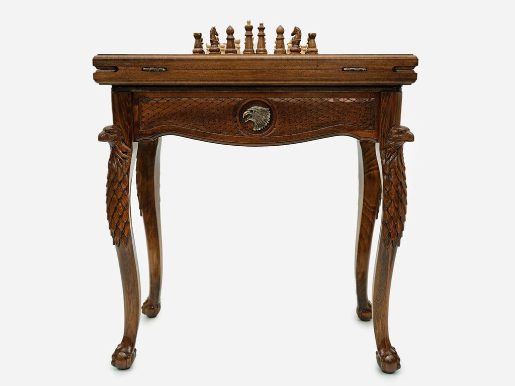 Eagle chess and backgammon table with chess pieces set up, front view