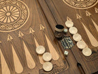 Close-up of the checkers, dice and cup on the eagle table