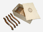 Pomegranate chess and backgammon table disassembled in its shipping crate