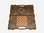 The cut-out carry handle and the upper carving of the lid
