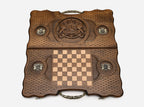 The ornate cast bronze carry handle fitted to the board