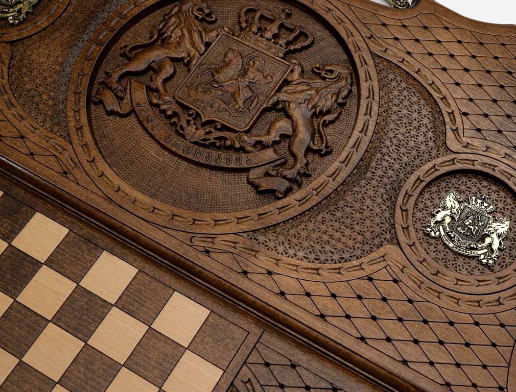 Detail of one of the cast bronze roundels flanking the carving