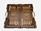 Angled view of the Georgian backgammon set showing the bronze handle along the top edge