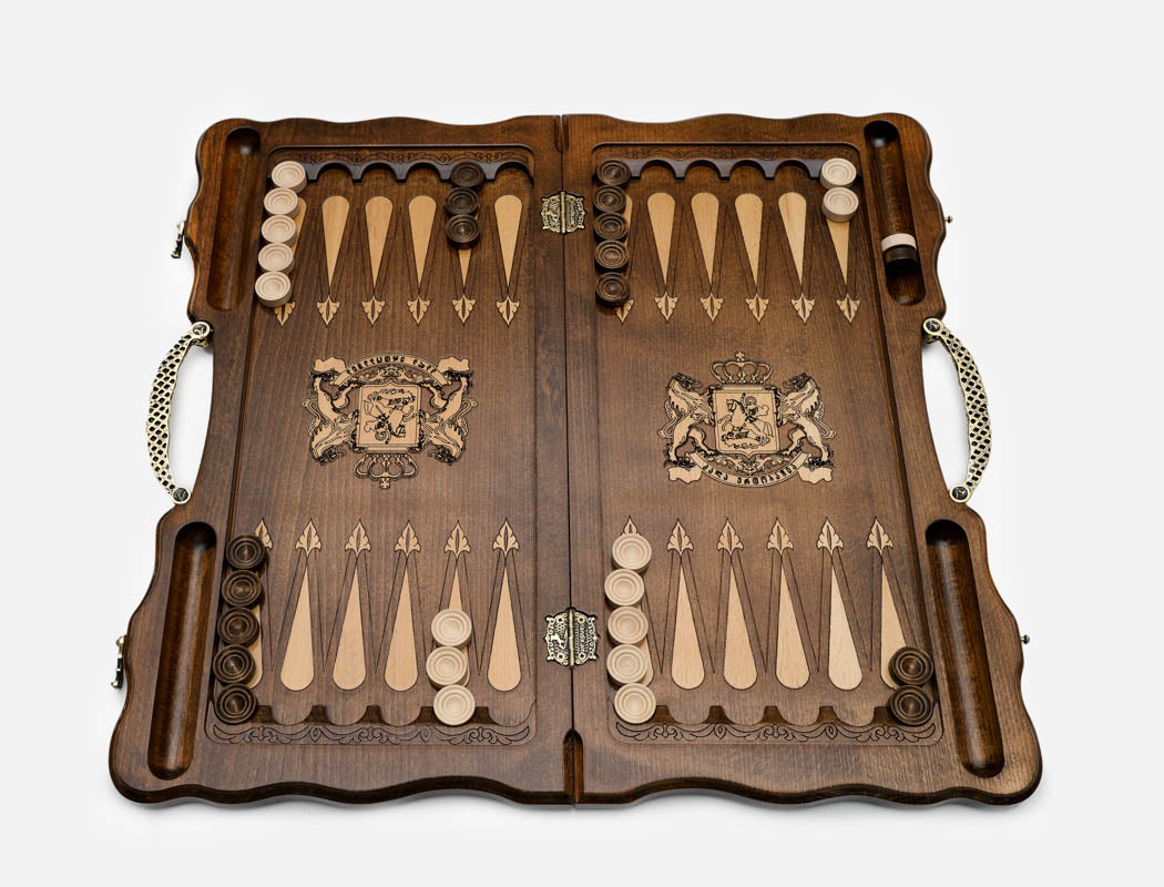 Angled view of the Georgian backgammon set showing the bronze handle along the top edge