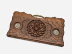 Side view of the folded board showing its depth and bronze hinges