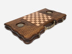 The ornate cast bronze carry handle fitted to the board