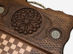 Angled view of the Armenian backgammon set showing the bronze handle along the top edge