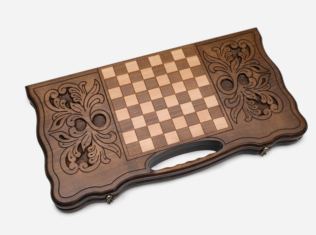 The cut-out carry handle and the upper carving of the lid