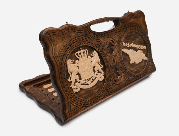 Carved Georgian backgammon board with the coat of arms and the map of Georgia, cut-out carry handle, propped open
