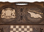 Angled view of the handmade Georgian backgammon set showing both carvings on the lid