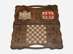 Angled view of the handmade Georgian backgammon set showing both emblems on the lid